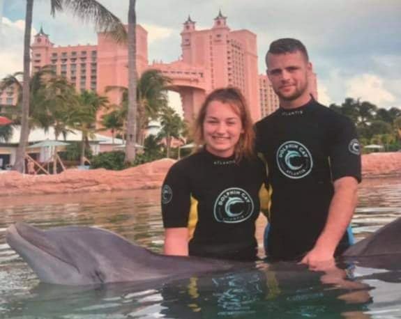 Cartridge also posted photos of her swimming with dolphins a month after the accident