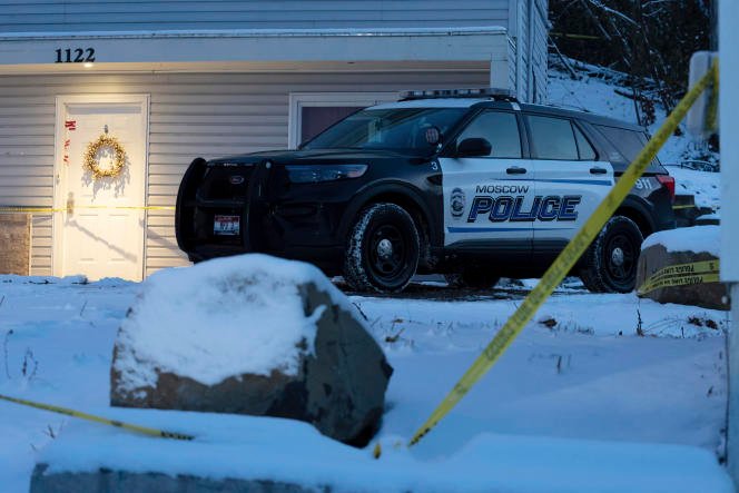 Police car in front of the house where four college students were killed in Moscow, Idaho, November 13, 2022.