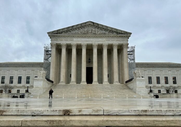 Supreme Court building in rain